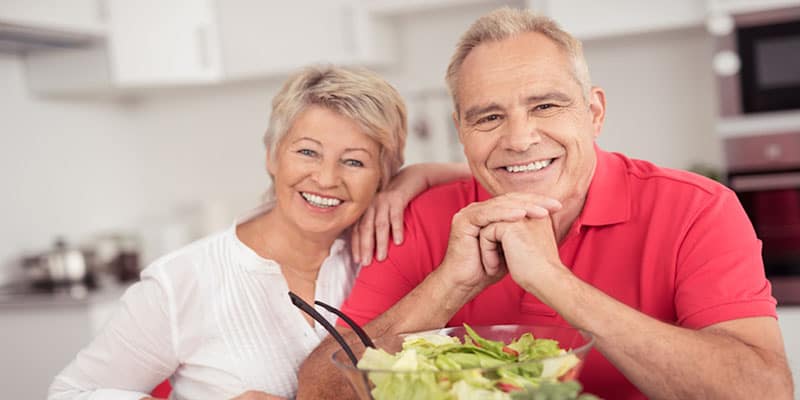 retired couple in kitchen